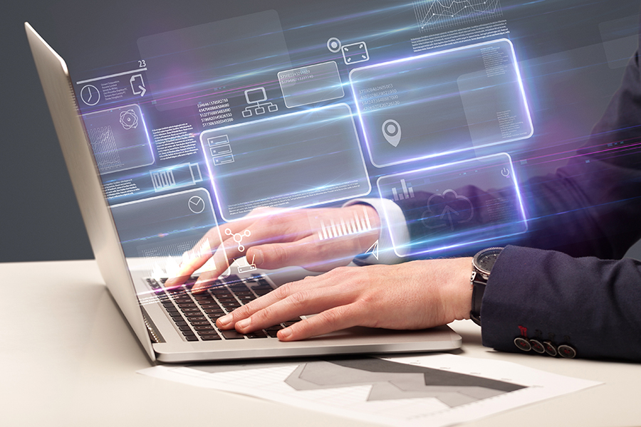 Hand typing on laptop with a system that is closed for modification but open for extension.